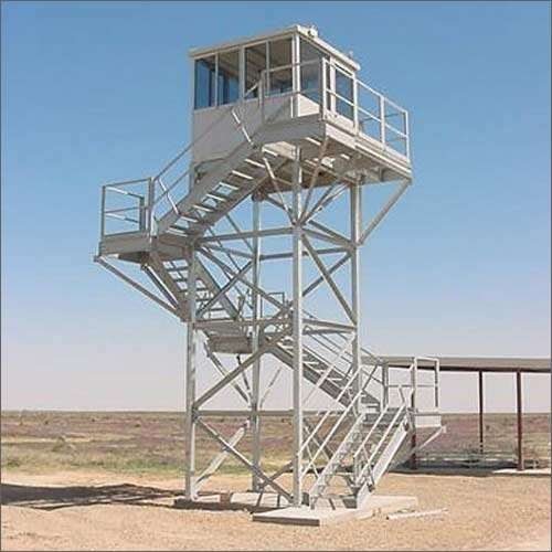 Elevated steel watch tower with cabin and staircase